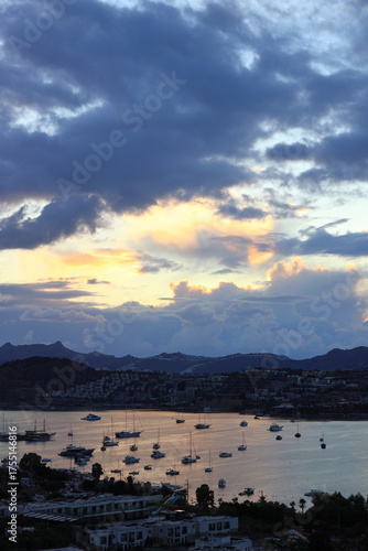 Aerial view of boats waiting in the bay during an autumn sunset in the famous holiday resort of Bodrum.