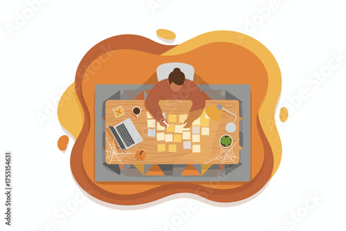 Productive person organizing ideas with sticky notes at a desk laptop autumn theme Planning concept