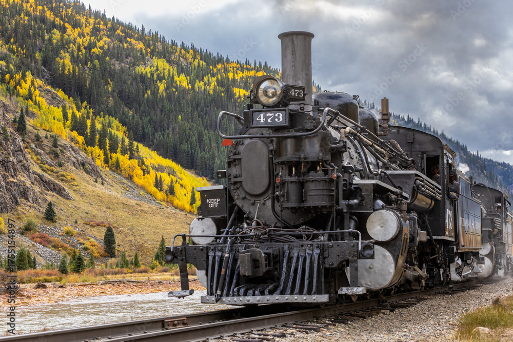 Naklejka premium Train Passing by in the Colorado Rockies