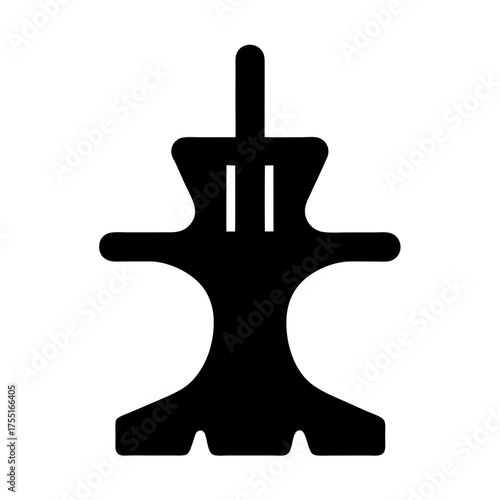 Stylized symmetrical figure with a central vertical element and extended arms