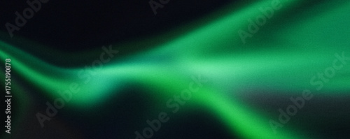 Abstract green aurora borealis effect with grainy texture on a dark background