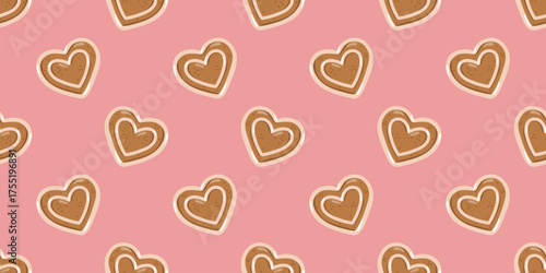 Seamless pattern with heart shaped gingerbread cookies on pink background. Vector sweet dessert background. 