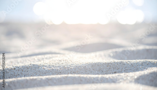 Texture with white sand and sparkling bokeh