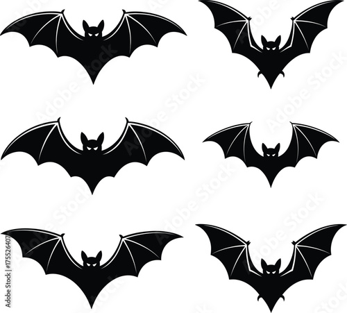 Black bat silhouettes spread wings flying
