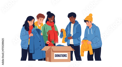 Diverse group of young people donating warm clothing for winter charity.