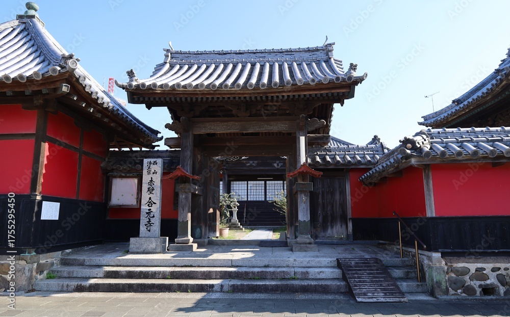 Naklejka premium A Japanese temple : a scene of the entrance gate to the precincts of Gogan-ji Temple in Nakatsu City in Oita Prefecture in Kyushu