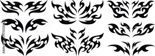 Black flame and tribal tattoo vector collection with symmetrical patterns, wings, and abstract shapes for body art and graphics.