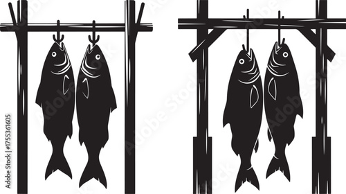 Drying fish silhouette on wooden racks