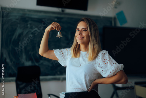 Teacher Rings the Bell for Break Time or Recess. Cheerful headmaster announcing the intermission period in school 