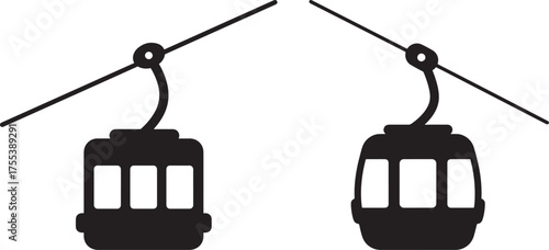 Two cable car gondolas silhouette
