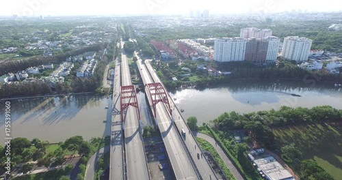 Aerial View of Ho Chi Minh City Skyline with Bridges and River