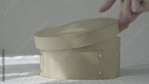 Open brown round carton box