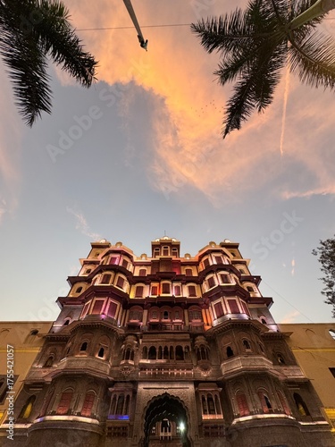 Rajwada Palace Indore—historic royal landmark, ornate Maratha architecture, carved wooden balconies and arched windows, iconic heritage building in Madhya Pradesh, India.