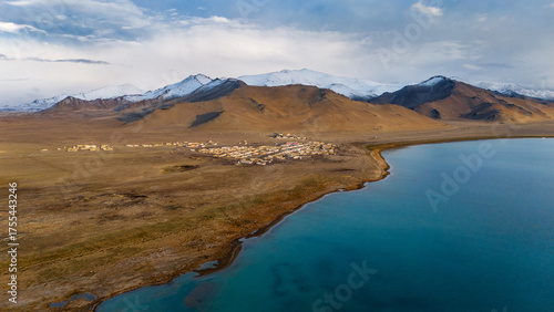 Fotografie Aerial view of Karakul village on the shore of Lake Karakul, Pamir Mountains, Tajikistan