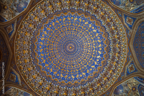 Fotografija Detailed shot of mosaic patterns and blue tiles of Sher-Dor Madrasa in Registan Square, Samarkand, Uzbekistan, symbol of Timurid architecture