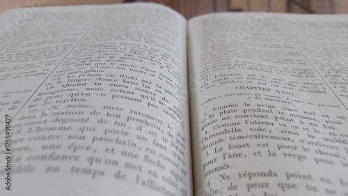 Parfondeval, Vervins, Aisne, Hauts-de-France, Grand-Est, France, August, 28th, 2025, A captivating closeup view of an open book, showcasing its beautifully printed pages and elegant typography in