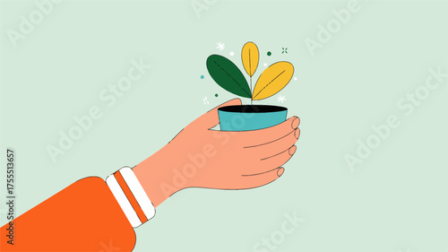 Hand holding a plant in a pot concept of growth, care, and sustainability perfect for illustrating environmental themes and promoting a green lifestyle and