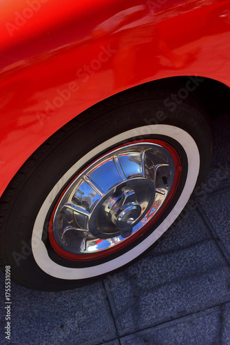 Ταπετσαρία Vintage red car's wheel with a classic white-wall tire and a chrome hubcap