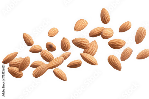 Scattered almonds floating in mid air against a black background nuts food 1