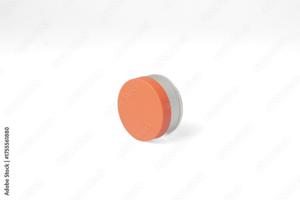 Obraz premium Make up cosmetic powder container or package on isolated white background.