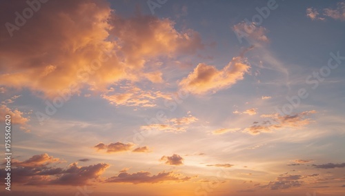 Dramatic sunset sky with vibrant orange clouds for inspiring backgrounds and uplifting designs, conveying peace, hope, and serene beauty in nature