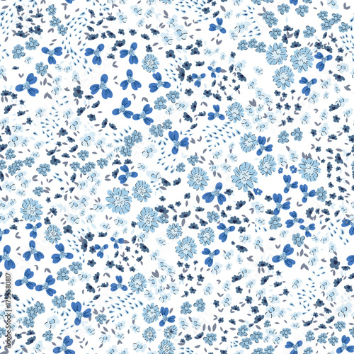 Cute floral background seamless Floral pattern with small monochrome blue flowers on a white background