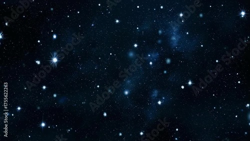 A vast, dark expanse with scattered luminous stars and faint nebulas