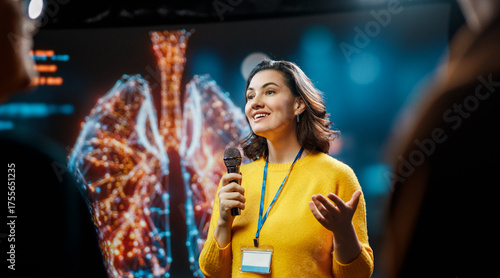 woman is giving a presentation at conference