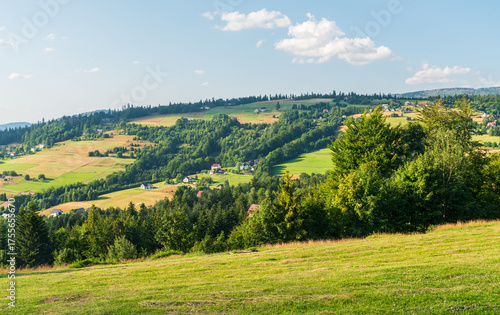Tyniok hill from Koczy Zamek hill near Koniakow village in Beskid Slaski mountains in Poland