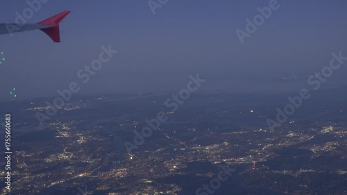 Stockholm, Sweden A plane flies over the suburbs in the early morning. 