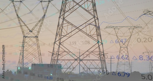 Showing steel transmission tower dominating landscape at dusk with power lines and chart overlay