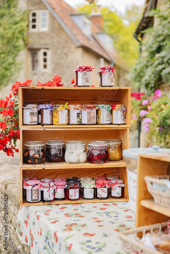 Obraz na plátně Shelf of jams and preserves for sale in small village