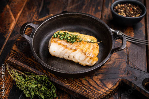 Canvas Print Roasted cod fish loin fiilet in skillet