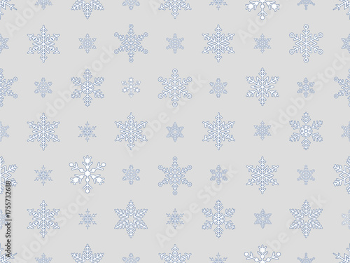 Seamless repeating pattern of snowflakes outlines of varying sizes and designs in dark blue color, on a light grey background.
