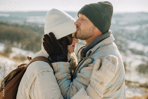 Wallpaper Mural Loving father kissing daughter's forehead on winter walk Torontodigital.ca