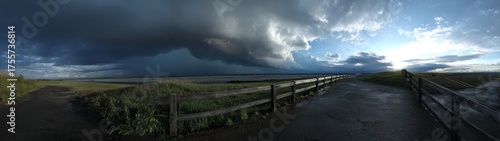 Dramatic storm clouds overfields hdr panorama nature landscape wide view