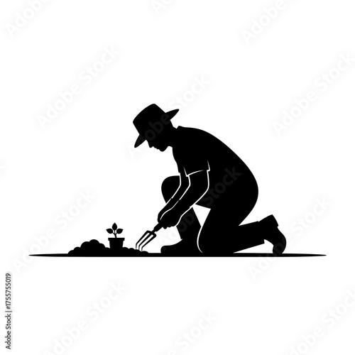 Dedicated gardener planting a seedling with a small trowel in fertile soil, embracing nature's growth and sustainable living.