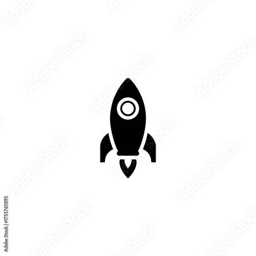 Silhouette of a rocket with exhaust flames