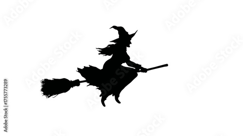 Black silhouette of a witch flying on a broomstick against a white background
