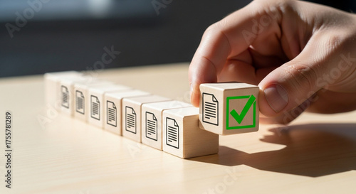 Confident hand places final checklist item, signifying successful task completion and project approval in a modern business setting.