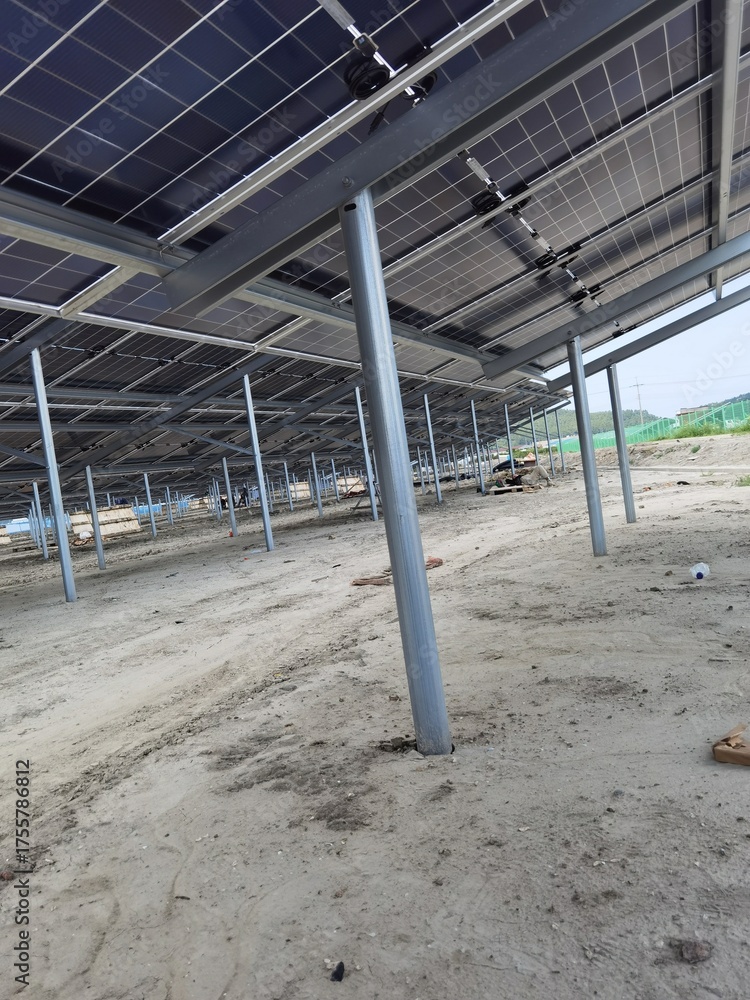 Fototapeta premium Building the Future: Solar Power Installation in Progress