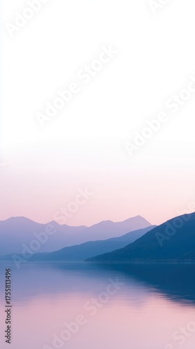 Serene landscape featuring soft pastel hues of mountains reflecting in calm water, creating a tranquil atmosphere with a sense of peace and natural beauty