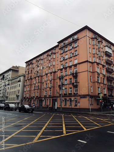 Red brick house in the city, old house on the street 