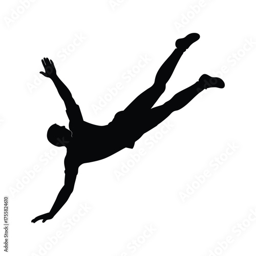 silhouette of a football goalkeeper diving