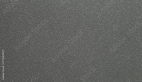 Dark engraved metal background. Engraved metal sheet texture. Engraved metal surface. Close up.