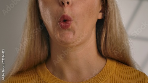 Canvas Print Close up of a mouth whistling