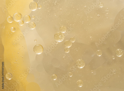 Abstract yellow water bubbles oil background