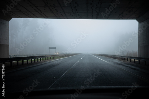 Driving in foggy weather on the highway. Driving in autumn and winter weather.