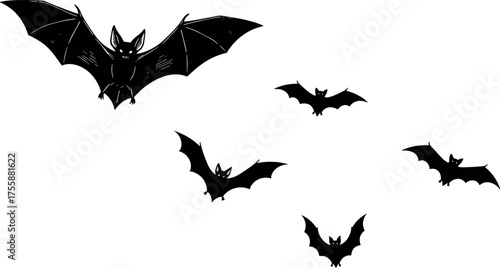 A flock of bats flying in the night sky, illustrating a spooky Halloween theme