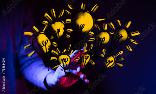 Hand displaying glowing lig...
